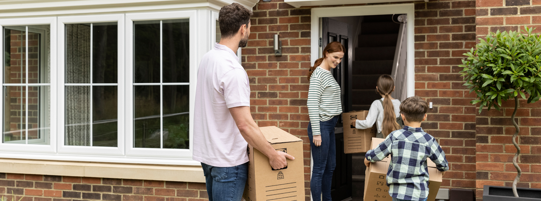 Family moving in to their new home